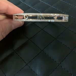 Michael Kors rose gold bangle bracelet with crystals.